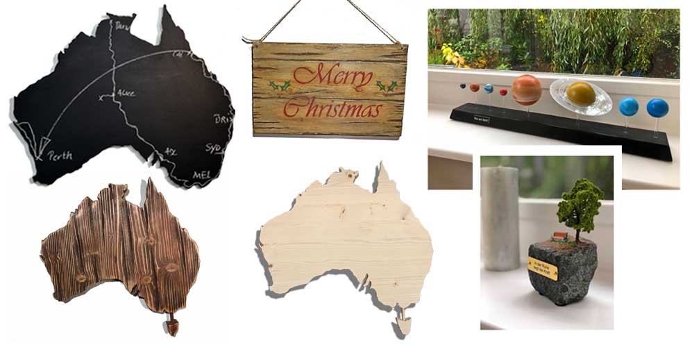Kollage verschiedener Holztafel in Form von Australien und andere Souveniers